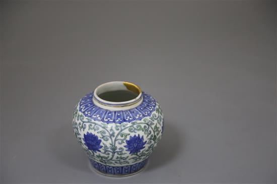 A rare Chinese doucai lotus flower jar, Wanli six character mark and probably of the period, (1573-1619), H. 9.5cm, D. 10.8cm, later